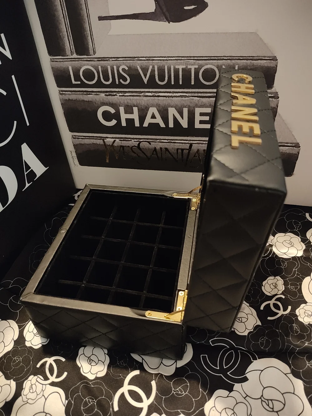 Black Quilted Jewelry Case with Gold Logo Accents And Mirror